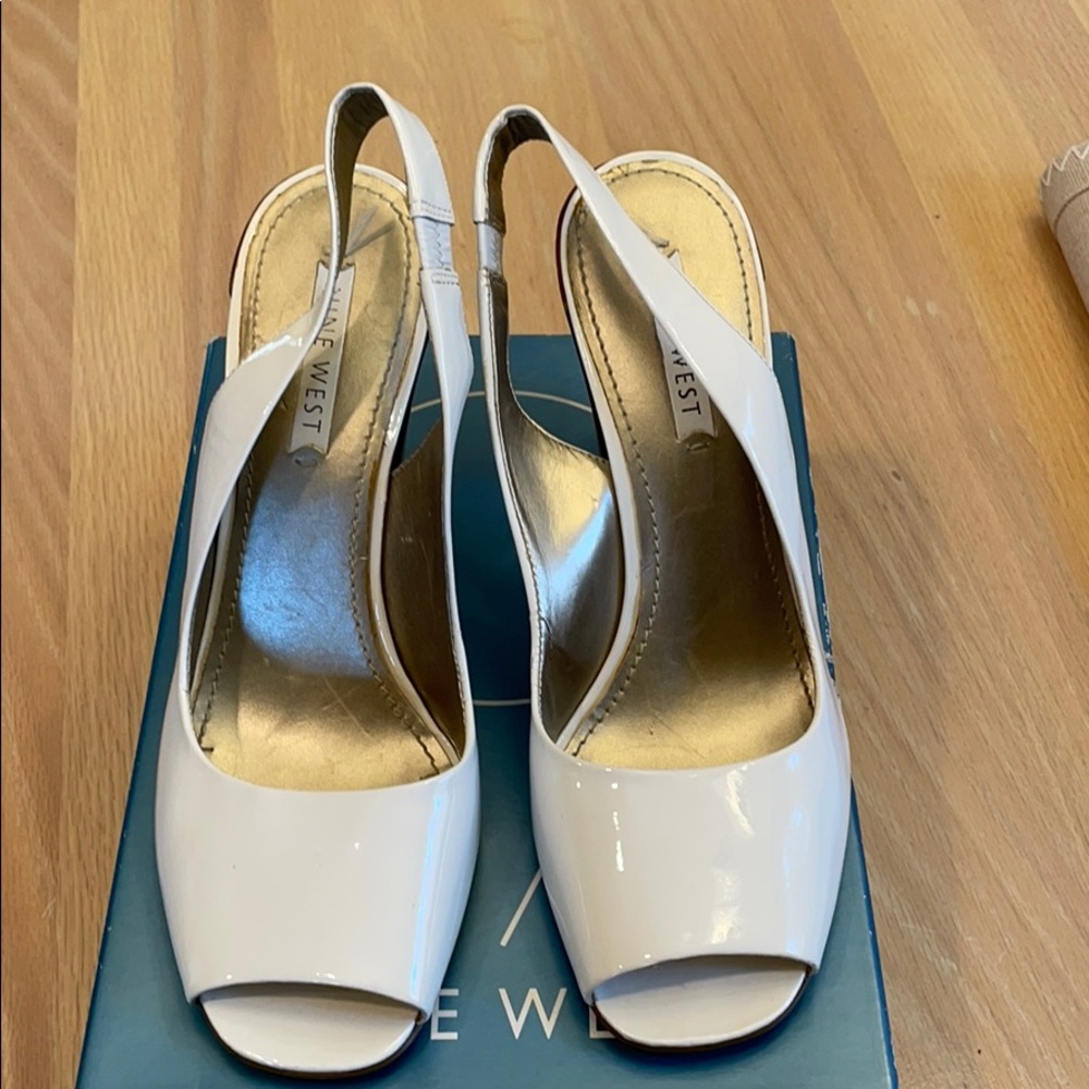 Women’s white Patent Leather shoe size 8